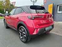 Gebraucht Opel Mokka 131 PS (96 kW) 2024 Rubin rot / dach schwarz SUV