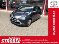 Gebraucht Toyota Aygo X-clusiv 69 PS (50 kW) 2016 Rauchgrau mica Kleinwagen