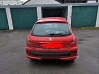 Gebraucht Peugeot 206+ 68 PS (50 kW) 2011 Rot Kleinwagen