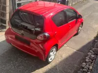 Gebraucht Toyota Aygo 69 PS (50 kW) 2012 Rot Kleinwagen