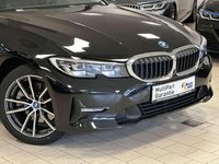 Gebraucht BMW 320e Performance 163 PS (119 kW) 2021 Saphirschwarz Kombi