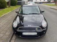 Gebraucht Mini Cooper 75 PS (55 kW) 2013 Schwarz Kleinwagen