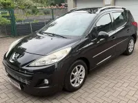 Gebraucht Peugeot 207 Tendance 95 PS (69 kW) 2012 Schwarz obsidien mitschutzlack Kombi