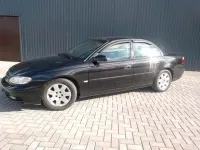 Second-hand Opel Omega 211 CP (155 kW) 1999 Negru Berlinǎ