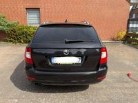 Używany Skoda Superb Elegance 170 KM (125 kW) 2011 Czarny Kombi