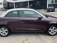 Używany Audi A1 Attraction 86 KM (63 kW) 2011 Czerwony Hatchback