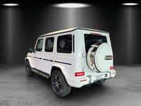 Gebraucht Mercedes G500 AMG line 421 PS (309 kW) 2024 Manufaktur opalithweiß magno SUV