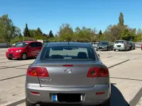 Używany Mazda 3 105 KM (77 kW) 2007 Szary Sedan/Limuzyna