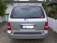 Gebraucht Kia Carnival 196 PS (144 kW) 2006 Grau metallic Van / Kleinbus