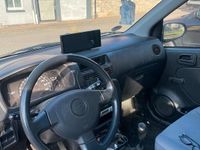 Gebraucht Daihatsu Cuore 58 PS (42 kW) 2003 Silber Kleinwagen