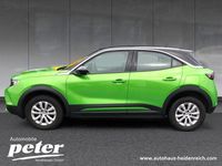 Gebraucht Opel Mokka Enjoy 101 PS (74 kW) 2024 Lackierung matcha green/typ aussenverkle (metallic) SUV