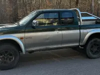 Gebraucht Mitsubishi L200 99 PS (72 kW) 2000 Grün Pickup