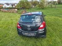 Second-hand Opel Corsa 75 CP (55 kW) 2013 Negru Hatchback