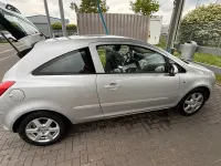Usado Opel Corsa Catch Me 80 HP (58 kW) 2007 Prateado Citadino