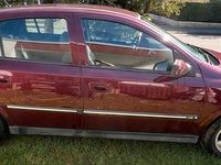 Second-hand Opel Astra 84 CP (61 kW) 2004 Roșu Berlinǎ