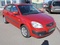 Second-hand Kia Rio 97 CP (71 kW) 2008 Portocaliu Berlinǎ
