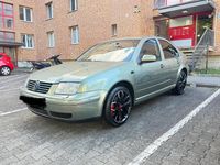 Second-hand VW Bora 110 CP (80 kW) 2003 Verde Berlinǎ