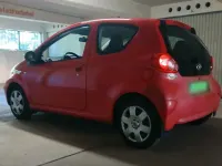 Gebraucht Toyota Aygo 68 PS (50 kW) 2005 Rot Kleinwagen