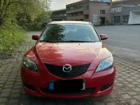 Używany Mazda 3 105 KM (77 kW) 2004 Czerwony Sedan/Limuzyna