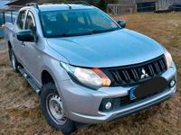 Używany Mitsubishi L200 153 KM (112 kW) 2015 Srebrny Pickup
