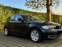 Gebraucht BMW 116 122 PS (89 kW) 2010 Schwarz Kleinwagen