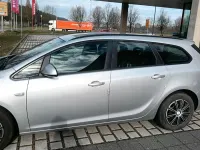 Second-hand Opel Astra 140 CP (102 kW) 2011 Argintiu Break