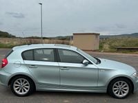 Second-hand BMW 118 143 CP (105 kW) 2009 Verde Hatchback