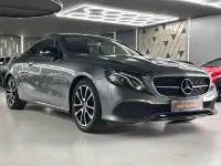 Gebraucht Mercedes E220 194 PS (142 kW) 2018 Selenitgrau  metalliclack Coupé