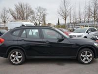 Second-hand BMW X1 150 CP (110 kW) 2014 Negru SUV