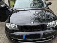 Second-hand BMW 116 122 CP (89 kW) 2011 Negru Hatchback