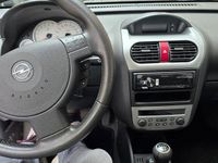 Second-hand Opel Corsa 60 CP (44 kW) 2006 Negru Hatchback
