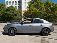 Używany Mazda 3 105 KM (77 kW) 2007 Szary Sedan/Limuzyna