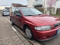 Gebraucht Mazda 323 88 PS (64 kW) 1997 Rot Kleinwagen