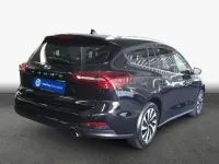Gebraucht Ford Focus Titanium 125 PS (91 kW) 2024 Agate black metallic Kombi
