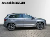 Gebraucht Skoda Karoq SportLine 190 PS (139 kW) 2023 Graphitegrau metallic SUV