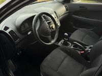 Gebraucht Hyundai i30 90 PS (66 kW) 2011 Schwarz Kombi