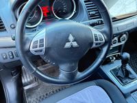 Gebraucht Mitsubishi Lancer 150 PS (110 kW) 2011 Schwarz Limousine