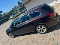 Gebraucht Opel Astra Edition 125 PS (91 kW) 2012 Braun Kombi