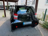 Gebraucht Toyota iQ 68 PS (50 kW) 2011 Schwarz Kleinwagen