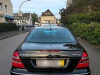 Second-hand Mercedes E320 224 CP (164 kW) 2005 Negru Berlinǎ