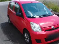 Gebraucht Daihatsu Cuore 69 PS (50 kW) 2007 Rot Kleinwagen