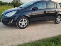 Używany Opel Corsa 69 KM (50 kW) 2012 Czarny Hatchback