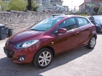 Gebraucht Mazda 2 75 PS (55 kW) 2012 Rot Kleinwagen
