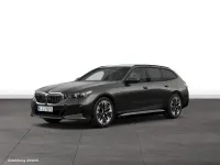 Gebraucht BMW 550e 489 PS (359 kW) 2026 Sophistograu brillanteffekt metallic Kombi