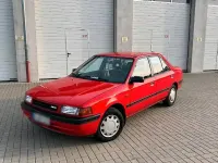 Gebraucht Mazda 323S 84 PS (61 kW) 1991 Rot Limousine