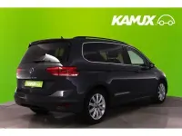 Second-hand VW Touran Highline 150 CP (110 kW) 2023 Gri Monovolum