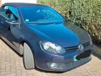 Używany VW Golf 105 KM (77 kW) 2011 Purpurowy Kabriolet