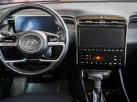 Gebraucht Hyundai Tucson Select 150 PS (110 kW) 2023 Sunset red / mic SUV