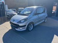 Gebraucht Peugeot 1007 Premium 109 PS (80 kW) 2009 Grau Van / Kleinbus