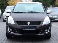 Gebraucht Suzuki Swift 94 PS (69 kW) 2014 Braun metallic Kleinwagen